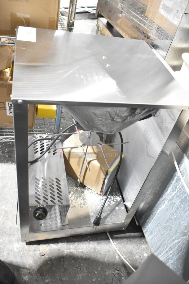 "Brand new 2024 Nemco 6403 dual rack revolving pretzel warmer, scratch, dent, missing glass, 120V, 1 phase."