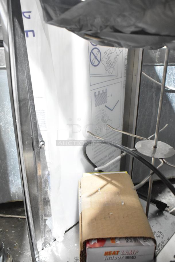 Brand new 2024 Nemco 6403 dual rack revolving pretzel warmer, missing glass, 120V, 1 phase.