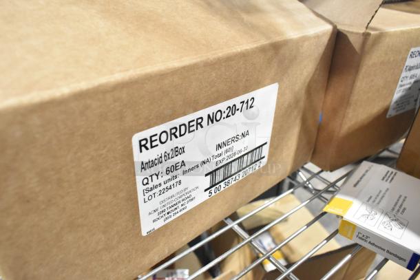 Brown box labeled "Antacid 6x2/Box," with reorder number 20-712 and expiration date 2028-06-30.