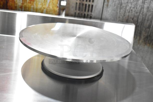 Matfer Bourgeat 12" Revolving Cake Stand, aluminum finish, brand new, perfect condition, ideal for baking tasks.