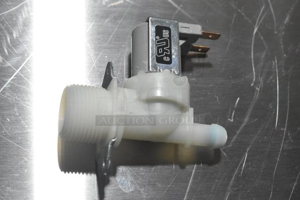 New inlet valve on metallic surface; labeled with C&U mark. Ideal for appliance repair, minor handling marks visible.