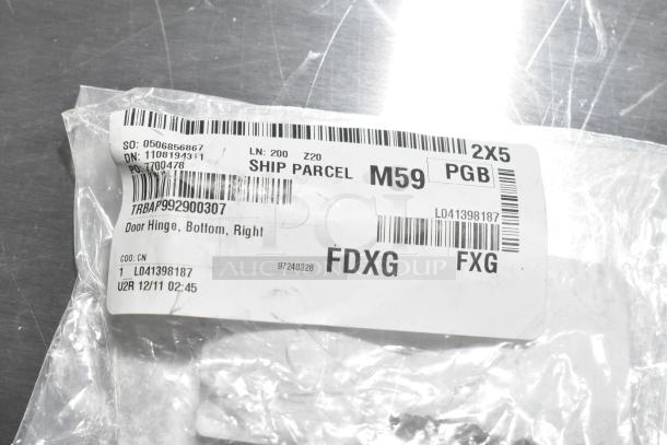 Clear plastic package with a label showing "Door Hinge, Bottom, Right," and shipping details. Brand new, scratch and dent condition.