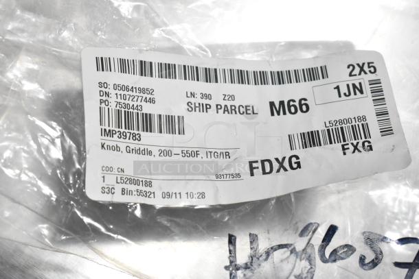 Clear plastic packaging labeled "Knob, Griddle, 200–550F, ITG/IR." Includes barcodes and shipment details.