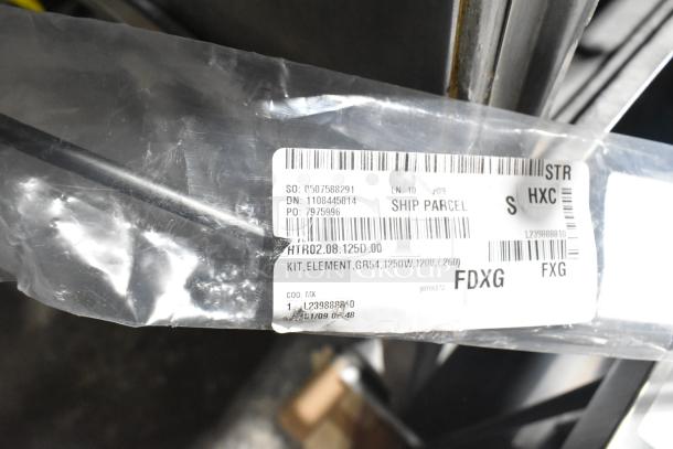 Brand new heating elements with scratches and dents, item label reads "KIT, ELEMENT, GR54, 1250W, 120V."