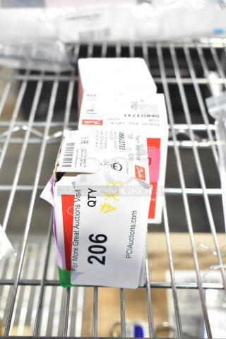 Three boxed expansion valves, brand new with scratch and dent notes, labeled with item and auction details.