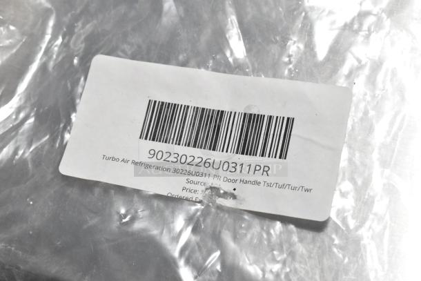 Barcode label on metallic packaging, item: Turbo Air Refrigeration 30226U0311-PR door handle, brand new condition.