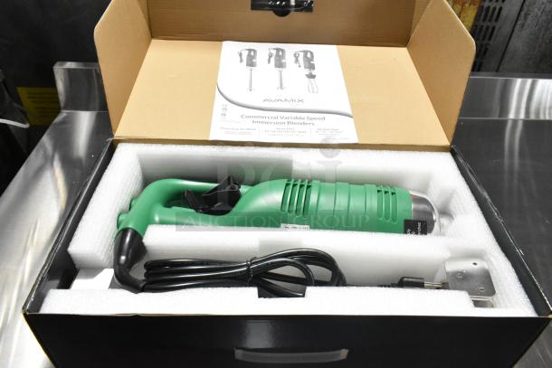 Brand new AvaMix 928IBHD12 12" immersion blender, 1 1/4 hp, variable speed, 115V, with packaging and manual visible.