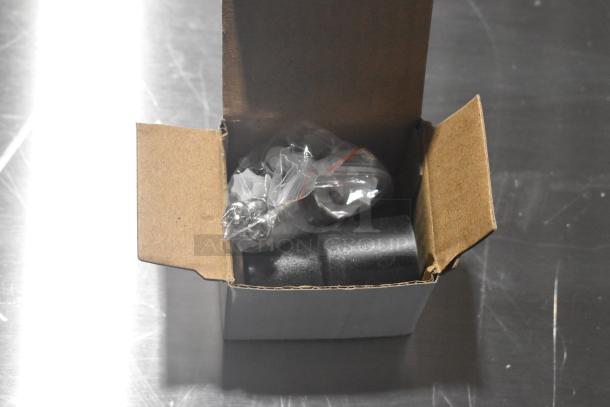 Cardboard box containing parts for the AvaMix 928IBHD12 immersion blender, with packaging materials visible.