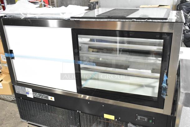 Avantco 193BC60HCB 60" refrigerated bakery display case; curved glass, black, scratch and dent condition, broken glass visible.