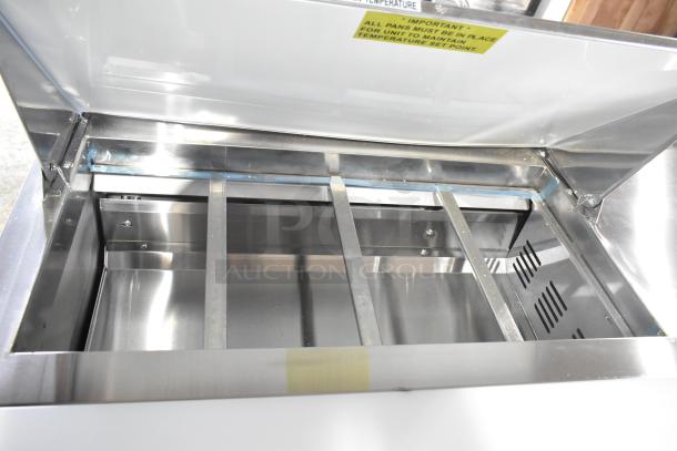 Brand new Avantco 178SSPT488 48" stainless steel refrigerated sandwich prep table, visible interior dividers and labels.