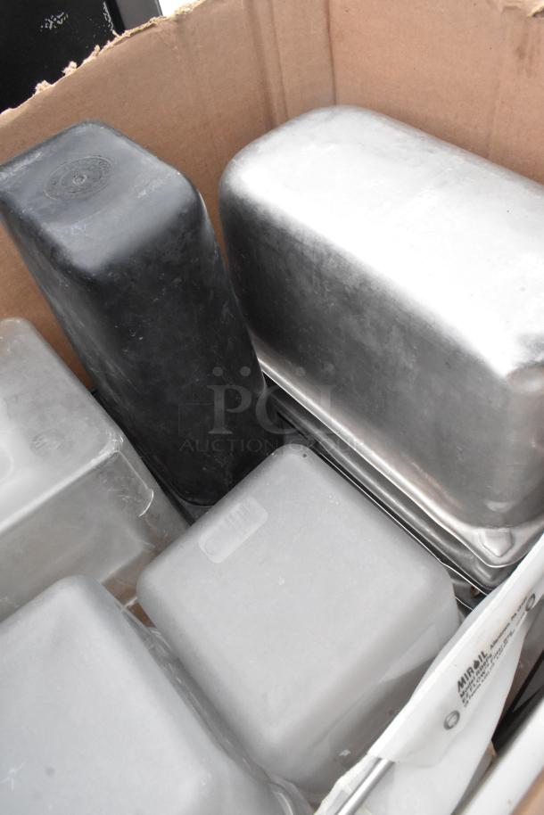 Lot of various items, including Edlund knife holder and drop-in bins, in fair condition, visible in a cardboard box.