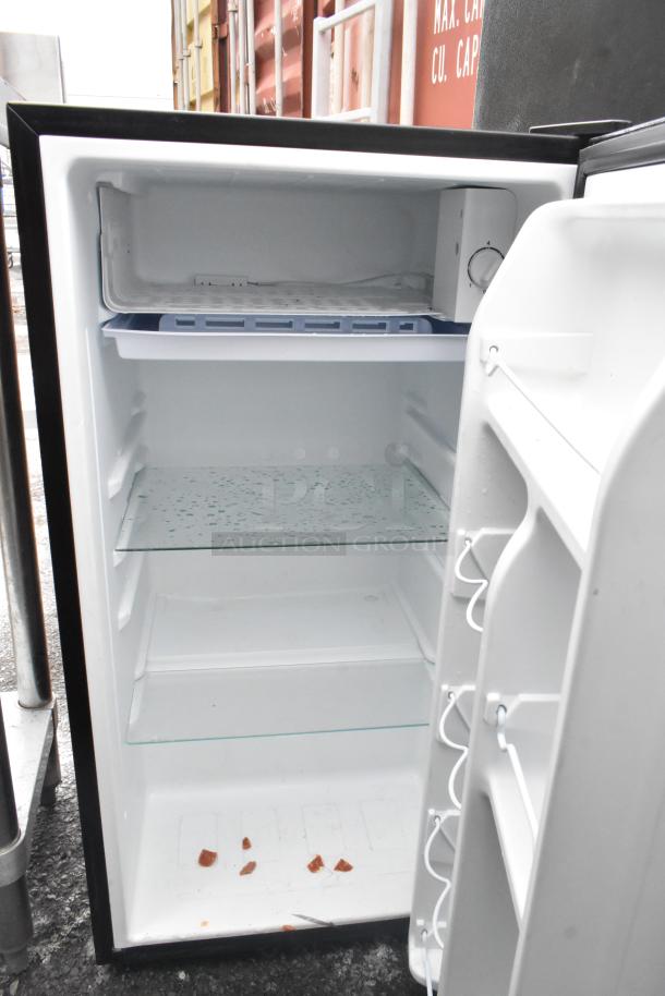 Three mini coolers, including Galanz and Hisense, 120 volts, 1 phase, open door view showing shelves, in good condition.