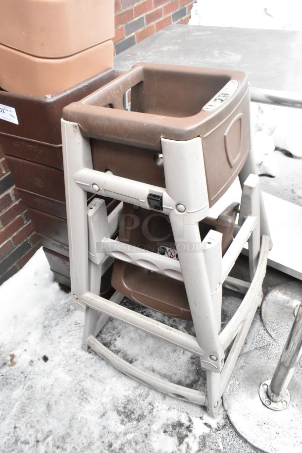 10 assorted items including 8 booster seats, 2 high chairs in used condition. Brown and beige colors. Auction lot tag visible.
