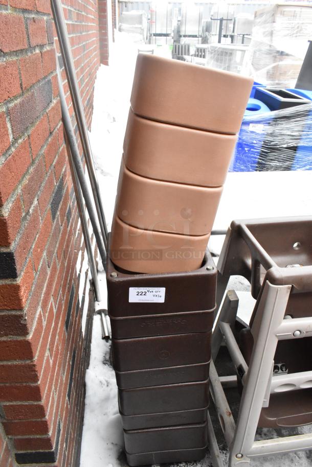 Stack of various booster seats and high chairs, in used condition, with auction label "222."
