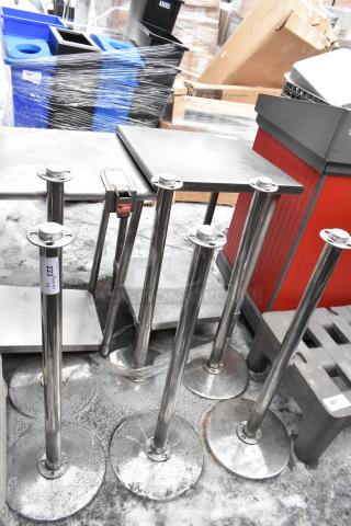 6 chrome finish stanchions, stainless steel, sturdy round bases, good condition. Label reads "223" indicating auction lot.