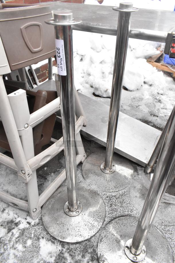 6 chrome finish stanchions in good condition with label indicating auction lot number 223, ideal for crowd control.