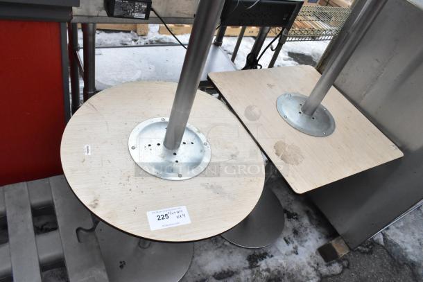 Four various tables with round and square tops, metal legs, visible wear. Auction label reads "225" and indicates "QTY 4".