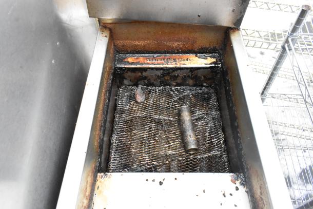 Pitco Frialator commercial gas fryer, floor style, includes 2 metal fry baskets, visibly used condition.