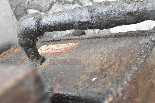 Pitco Frialator commercial gas fryer, weathered condition, surface rust and buildup visible, includes 2 metal baskets.