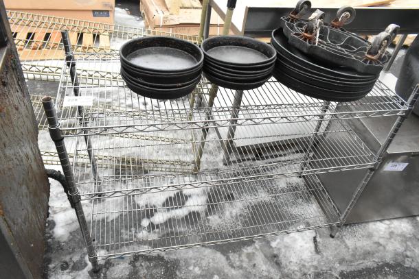 Chrome finish 3 tier wire shelving unit, dismantling required, visible tag indicates auction lot number.