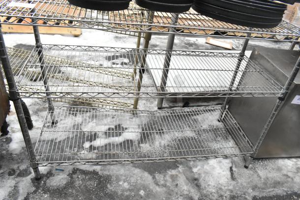 Chrome finish 3-tier wire shelving unit in used condition. Buyer must dismantle; shipping not provided by PCI.