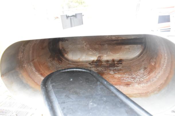 3 Tier Wire Shelving Unit with contents, showing interior detail. Buyer must dismantle. Consider freight charges.