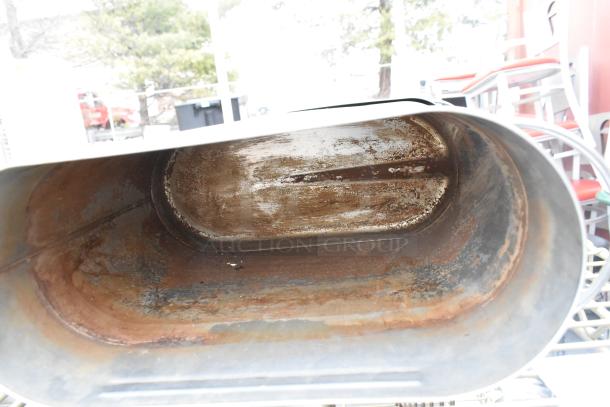 3 tier wire shelving unit with contents, visible internal rust and wear, buyer must dismantle, consider freight charges.