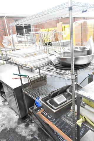 Chrome finish 4-tier wire shelving unit with bowls, drop-in bins, and signs. Good condition. Buyer must dismantle.