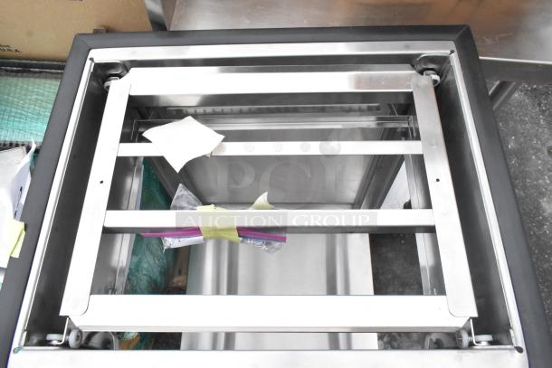 Stainless steel Lakeside 996 mobile tray dispenser, 150 tray capacity, brand new condition with minor scratches and open sides.