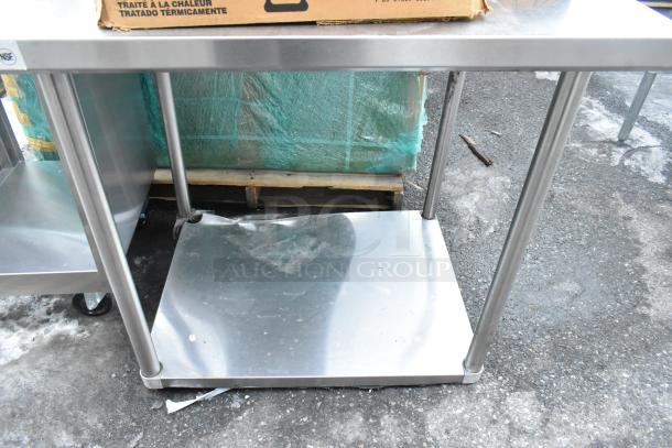 Regency 600TSB3036S stainless steel table with contents; includes glasses and bowls. Clean, sturdy condition. NSF certified label visible.