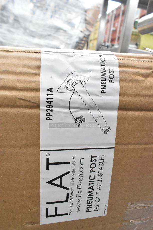 Pallet of mixed items including shelves, poly bins, bowls, and a table base post. Box labeled "FLAT Pneumatic Post, adjustable."
