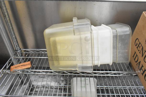 Chrome finish 3-tier wire shelving unit with fry baskets, bins, and contents. Buyer must dismantle. Freight charges applicable.