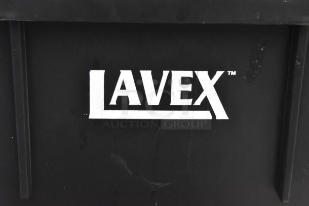 Brand new Lavex slim line trash can with logo, showing minor scratches and dents. Auction includes six units.