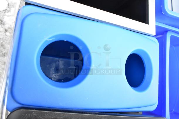 Set of 6 brand new slim line trash cans, scratch and dent condition, blue color with circular lid openings.