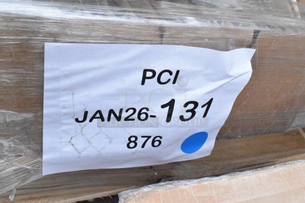 Pallet with wrapping tagged "PCI JAN26-131 876," containing 6 new scratch-and-dent items including sink, chair, posts.