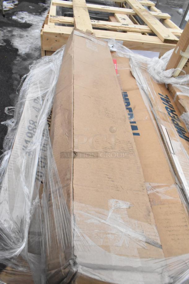 Pallet of 8 new scratch-and-dent items including anti-fatigue floor mat and sink, in original packaging.