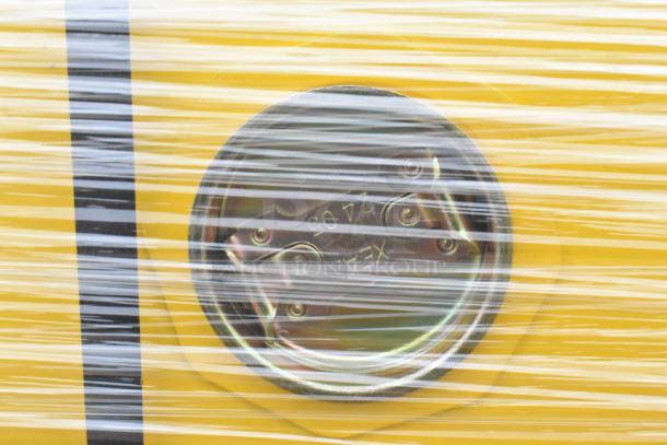 Yellow steel flammable liquids cabinet, Durham Mfg 1060S-50, 60-gallon, new with scratches, visible vent detail behind wrap.