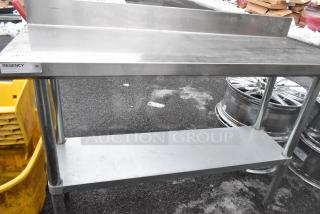 Regency 600TB1848G commercial table with under shelf, stainless steel, label indicates NSF certification, used condition.