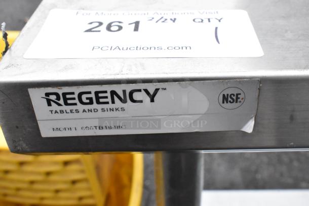 Regency 600TB1848G commercial table with under shelf, steel construction, minor wear, NSF certified.