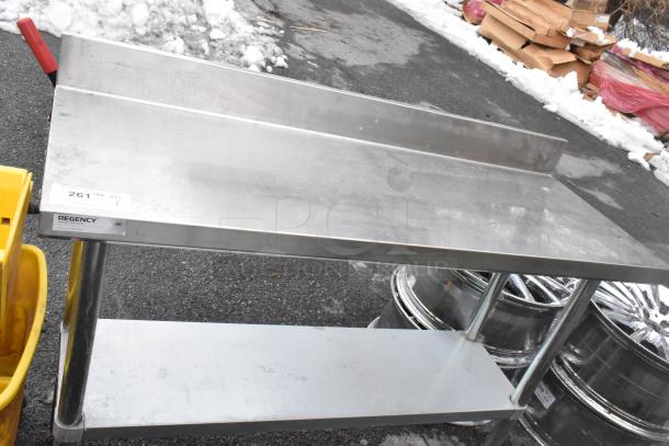 Regency 600TB1848G commercial table with under shelf, stainless steel, excellent condition, label shows brand and model.
