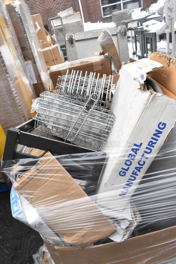 Pallet lot with metal baskets, light fixture, hose, in boxes marked "Global Manufacturing," mixed condition.