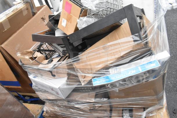 Pallet lot with metal baskets, light fixture, hose, and assorted items in boxes. Items appear in mixed condition, suitable for auction.