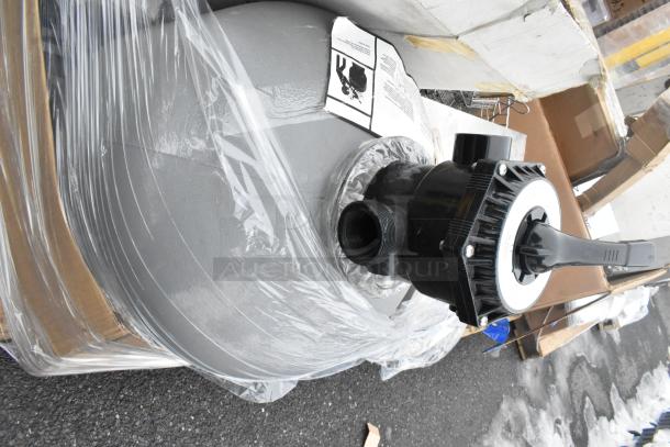 Pallet lot containing metal baskets, a light fixture, and a hose, wrapped in plastic. Items appear new or unused.