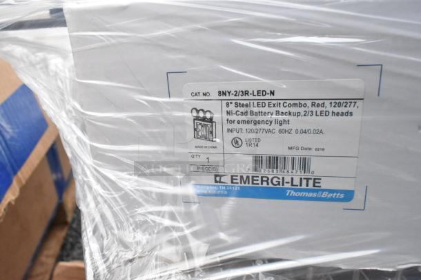 Pallet lot including metal baskets, light fixture, and hose. Box labeled Emergi-Lite LED exit combo, 8", red, with battery backup.