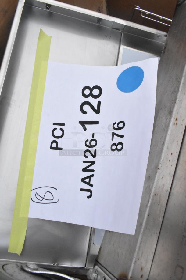 6 new scratch and dent items, including Koala Kare Infant Seat Kradles, utility sink, ice bin. Auction tag PCI JAN26-128 visible.