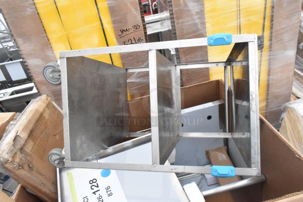 6 scratch and dent items including a Koala Kare infant seat kradle and utility sink; new condition, in packaging.