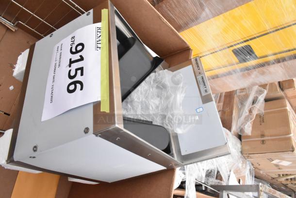 Brand new scratch and dent items including Koala Kare infant seat kradles, visible Regency utility sink with packaging.