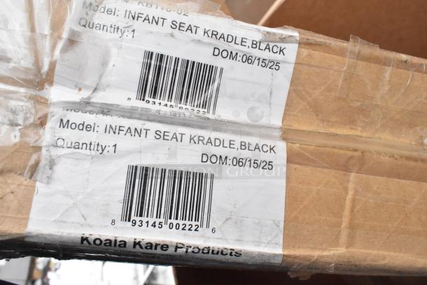 Cardboard box with labels for Koala Kare Infant Seat Kradles. Model: Black, Quantity: 1, DOM: 06/15/25.