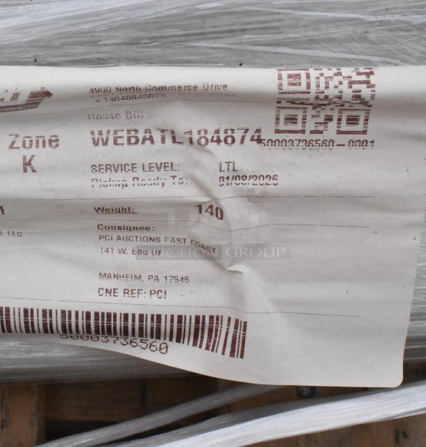 Label for WEBATL184874 unit, shipped to PCI Auctions East Coast, 140 lbs, service level LTL, dated 01/10/2023.