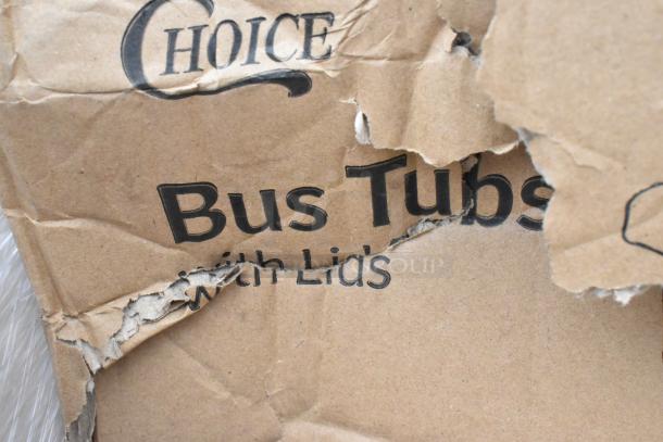 Damaged cardboard box labeled "Choice Bus Tubs with Lids." Part of auction lot of 36 new scratch and dent items.